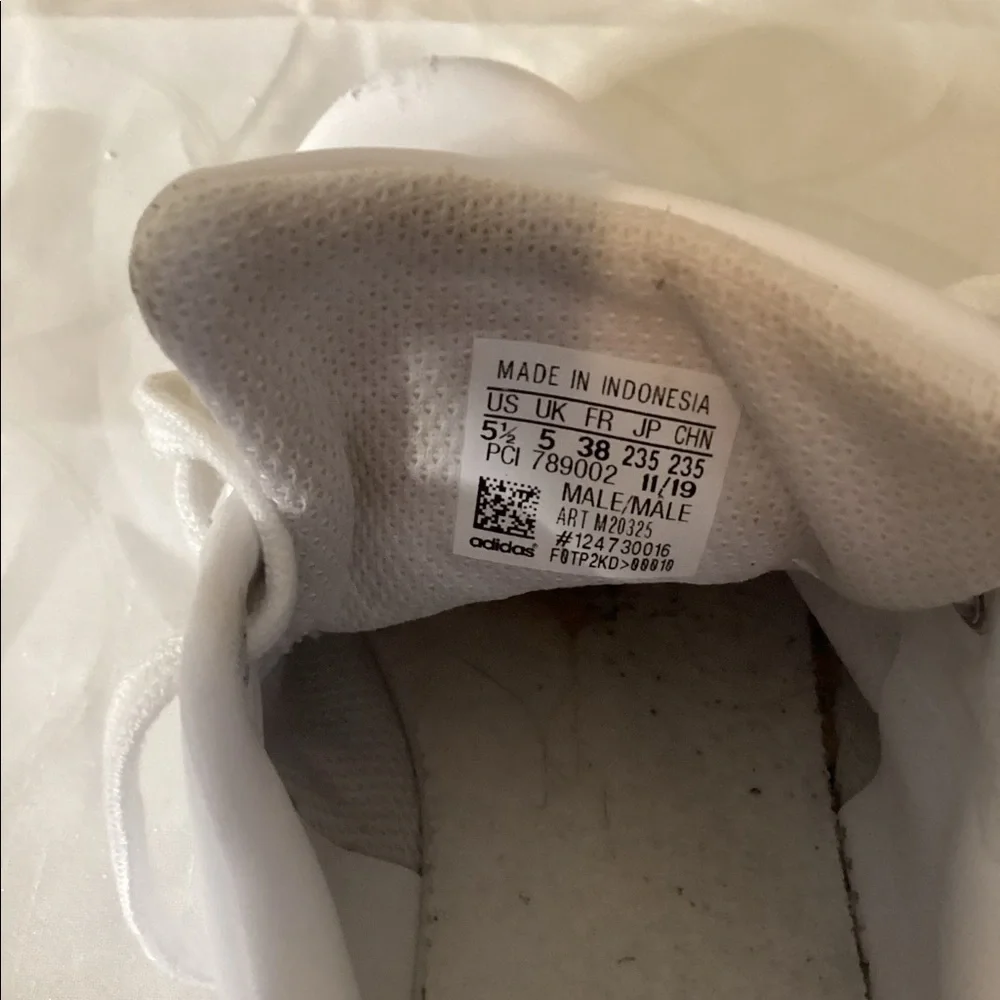 Adidas Stan Smith Leather Sneaker (men’s or women’s)